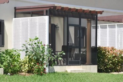 PATIO ENCLOSURE WITH CORRUGATED ROOF