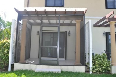 PATIO ENCLOSURE WITH CORRUGATED ROOF