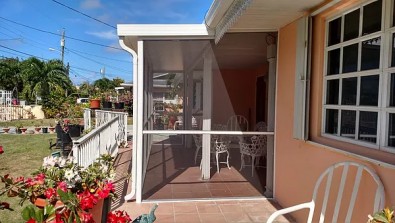 PATIO ENCLOSURE WITH INSULATED ROOF