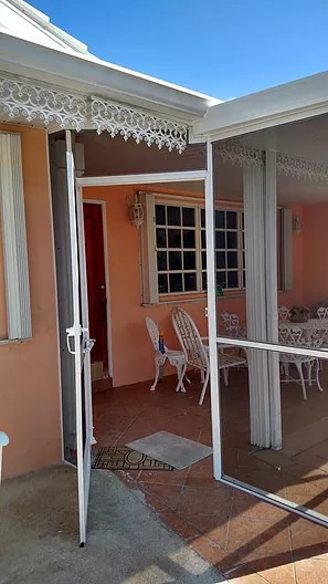 PATIO ENCLOSURE WITH INSULATED ROOF