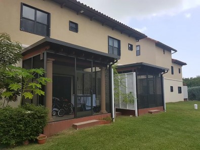 PATIO ENCLOSURE WITH INSULATED ROOF