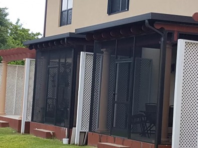 PATIO ENCLOSURE WITH INSULATED ROOF