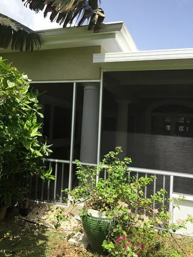 PATIO ENCLOSURE WITH INSULATED ROOF & PICKET SYSTEM