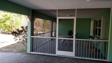 PATIO ENCLOSURE WITH INSULATED ROOF & PICKET SYSTEM