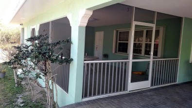 PATIO ENCLOSURE WITH INSULATED ROOF & PICKET SYSTEM