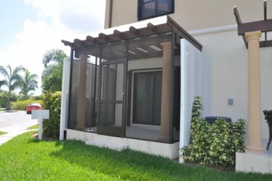 PATIO ENCLOSURE WITH CORRUGATED ROOF