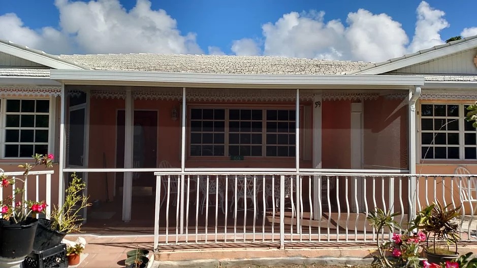 PATIO ENCLOSURE WITH INSULATED ROOF