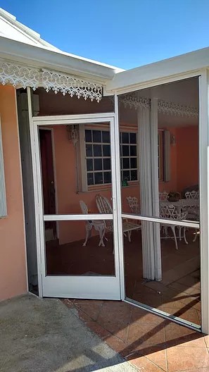 PATIO ENCLOSURE WITH INSULATED ROOF