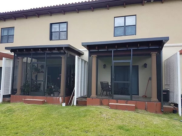 PATIO ENCLOSURE WITH INSULATED ROOF