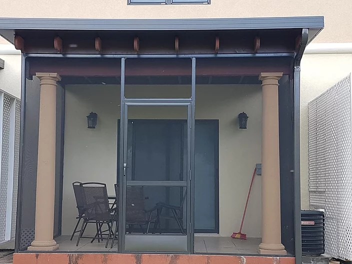 PATIO ENCLOSURE WITH INSULATED ROOF